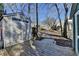 Wooden deck and storage shed with pathway to backyard at 4065 Delamar Dr, Cumming, GA 30041