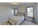 Bright bedroom with carpet floors and large windows at 4065 Delamar Dr, Cumming, GA 30041