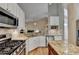 Kitchen with granite countertops and stainless steel appliances at 4065 Delamar Dr, Cumming, GA 30041