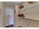 Laundry room with shelving and exterior access at 4065 Delamar Dr, Cumming, GA 30041