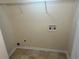 Laundry closet with shelving and hookups at 4551 Jackybell Trl, Decatur, GA 30034