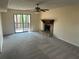 Living room with fireplace and access to deck at 4551 Jackybell Trl, Decatur, GA 30034