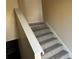 Carpeted staircase leading to the second floor at 4551 Jackybell Trl, Decatur, GA 30034