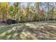 Large backyard with shed and wooded area at 728 Harmony Rd, Temple, GA 30179