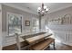 Formal dining room with a light and airy feel and wood flooring at 728 Harmony Rd, Temple, GA 30179