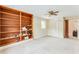 Bedroom with a ceiling fan, built-in shelving, and a walk-in closet at 3119 E Fairview Rd, Mcdonough, GA 30252