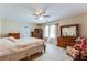 Comfortable bedroom boasts natural light, and classic furnishings at 3119 E Fairview Rd, Mcdonough, GA 30252