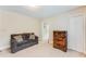 Versatile bonus room featuring a comfortable seating area and ample closet space at 3119 E Fairview Rd, Mcdonough, GA 30252