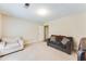 Versatile bonus room featuring a comfortable seating area and ample space at 3119 E Fairview Rd, Mcdonough, GA 30252
