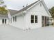 Exterior side view of a one story home with a deck and screened in porch at 3119 E Fairview Rd, Mcdonough, GA 30252