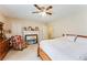Inviting bedroom features a fireplace, comfortable furnishings, and neutral decor at 3119 E Fairview Rd, Mcdonough, GA 30252