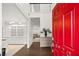 Bright entryway with hardwood floors and a view into the adjacent room at 3920 Village Estates Ct, Cumming, GA 30040