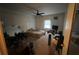 Main bedroom with ceiling fan and window at 103 Dogwood Ln, Auburn, GA 30011