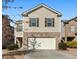 Two-story townhome with attached garage and landscaping at 116 Centennial Ridge Dr, Acworth, GA 30102