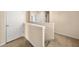 Upstairs hallway with carpet and access to bedrooms at 116 Centennial Ridge Dr, Acworth, GA 30102