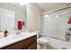 Bathroom with tub and shower combo at 4145 Roseman Bridge Ct, Suwanee, GA 30024