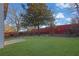 Large backyard with grassy area and privacy fence at 6110 Dorsett St, Douglasville, GA 30134