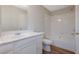 Neat bathroom with white vanity and tub shower at 6110 Dorsett St, Douglasville, GA 30134
