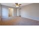 Spacious bedroom with carpet flooring and access to bathroom at 6110 Dorsett St, Douglasville, GA 30134