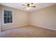 Well-lit bedroom with ceiling fan and closet at 6110 Dorsett St, Douglasville, GA 30134