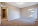 Simple bedroom with neutral walls and carpet flooring at 6110 Dorsett St, Douglasville, GA 30134