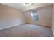 Spacious bedroom with neutral walls and carpet at 6110 Dorsett St, Douglasville, GA 30134