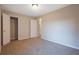 Spacious bedroom with neutral walls and carpet at 6110 Dorsett St, Douglasville, GA 30134