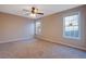 Bright bedroom with ceiling fan and carpet flooring at 6110 Dorsett St, Douglasville, GA 30134