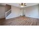 Spacious living room featuring hardwood floors and a ceiling fan at 6110 Dorsett St, Douglasville, GA 30134