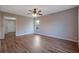 Living room with hardwood floors, a window, and a ceiling fan at 6110 Dorsett St, Douglasville, GA 30134