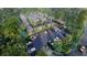 Community of modern homes with parking and surrounding trees at 6305 Shannon Pkwy # 201, Union City, GA 30291