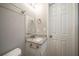 Cozy bathroom featuring a modern vanity and updated fixtures at 6520 Chickasaw Dr, Douglasville, GA 30135