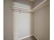 Walk-in closet featuring carpet and a closet rod for clothing storage at 6520 Chickasaw Dr, Douglasville, GA 30135