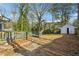 Large backyard with deck, shed, and mature trees at 1770 Lee St, Decatur, GA 30035