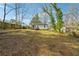 Large backyard with a view of the house and neighboring properties at 1770 Lee St, Decatur, GA 30035