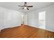 Well-lit bedroom with hardwood floors and ceiling fan at 1770 Lee St, Decatur, GA 30035