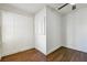 Small bedroom with wood flooring and built-in storage at 1770 Lee St, Decatur, GA 30035