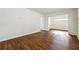 Living room with hardwood floors and a view into another room at 1770 Lee St, Decatur, GA 30035