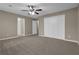 Bright bedroom featuring ceiling fan and ample closet space at 2105 Cornerstone Sw Ln, Marietta, GA 30064