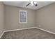 Cozy bedroom featuring a ceiling fan and window at 2105 Cornerstone Sw Ln, Marietta, GA 30064