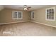 Bedroom with neutral walls and carpeting at 2105 Cornerstone Sw Ln, Marietta, GA 30064