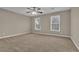 Spacious bedroom with neutral walls and carpet at 2105 Cornerstone Sw Ln, Marietta, GA 30064