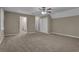 Main bedroom with carpet and access to the bathroom at 2105 Cornerstone Sw Ln, Marietta, GA 30064