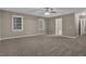 Large bedroom with carpet flooring and ceiling fan at 2105 Cornerstone Sw Ln, Marietta, GA 30064