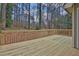 Wooden deck overlooks a wooded backyard at 2105 Cornerstone Sw Ln, Marietta, GA 30064