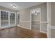 Bright dining area with hardwood flooring and access to the kitchen at 2105 Cornerstone Sw Ln, Marietta, GA 30064