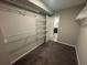 This large walk-in closet is equipped with multiple wire shelves for maximum storage space at 2113 Garden Pl, Atlanta, GA 30316