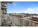 Balcony with table and chairs, offering views of the city at 250 Pharr Ne Rd # 413, Atlanta, GA 30305