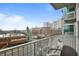 Private balcony with city views and seating area at 250 Pharr Ne Rd # 413, Atlanta, GA 30305