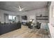 Open living area with dining area, exposed ceiling and balcony view at 250 Pharr Ne Rd # 413, Atlanta, GA 30305